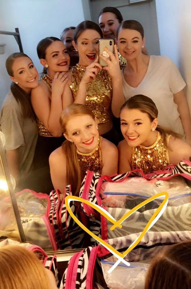 DPAC competition dancers backstage in gold costumes